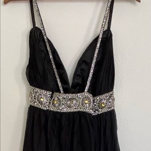 Floor length black dress with embellishments